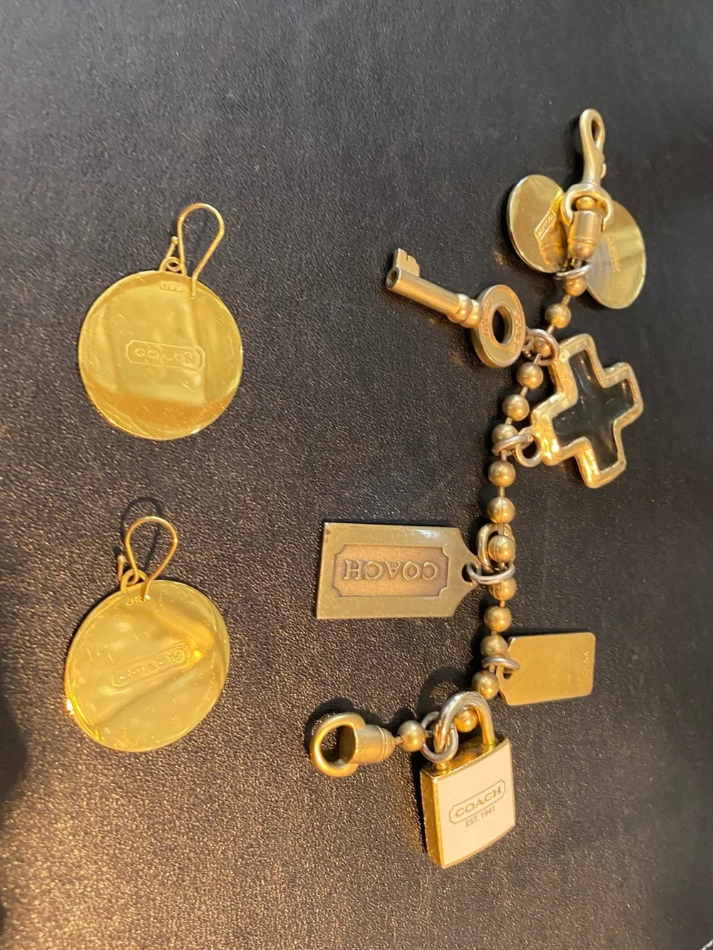 COACH Gold-Tone Brass Charm Bracelet with Signature C Logo Disc Drop Earring Set